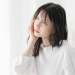 親知らずが虫歯で歯が痛い女性